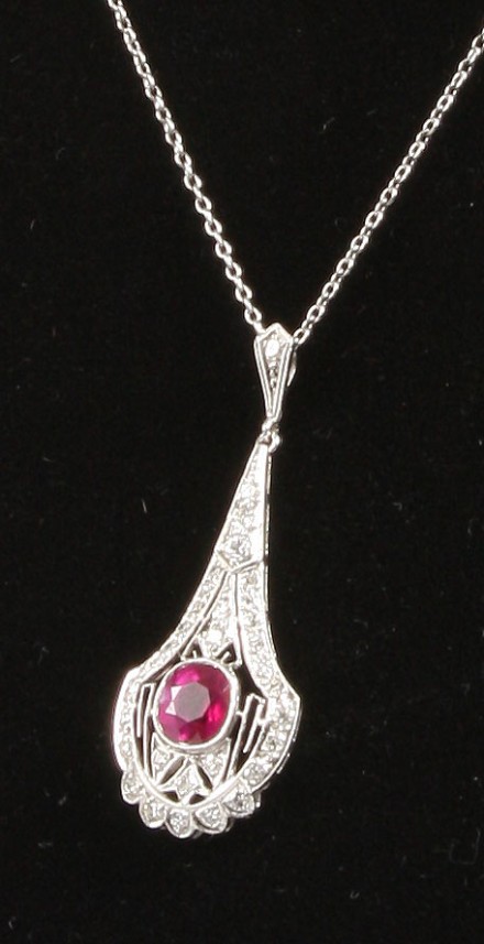 Appraisal: Platinum one mm x mm oval pink sapphire ct diamonds