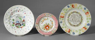 Appraisal: Three ABC plates one round with Robinson Crusoe raised floral