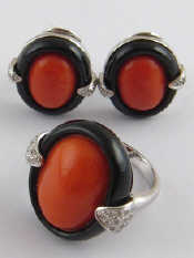 Appraisal: A suite of white metal tests carat gold coral onyx