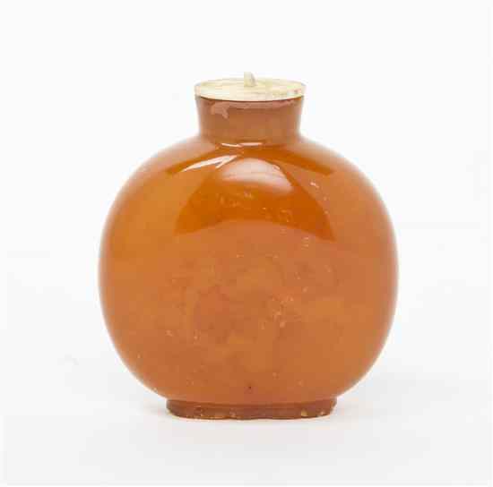 Appraisal: An Amber Snuff Bottle of compressed globular form Height inches