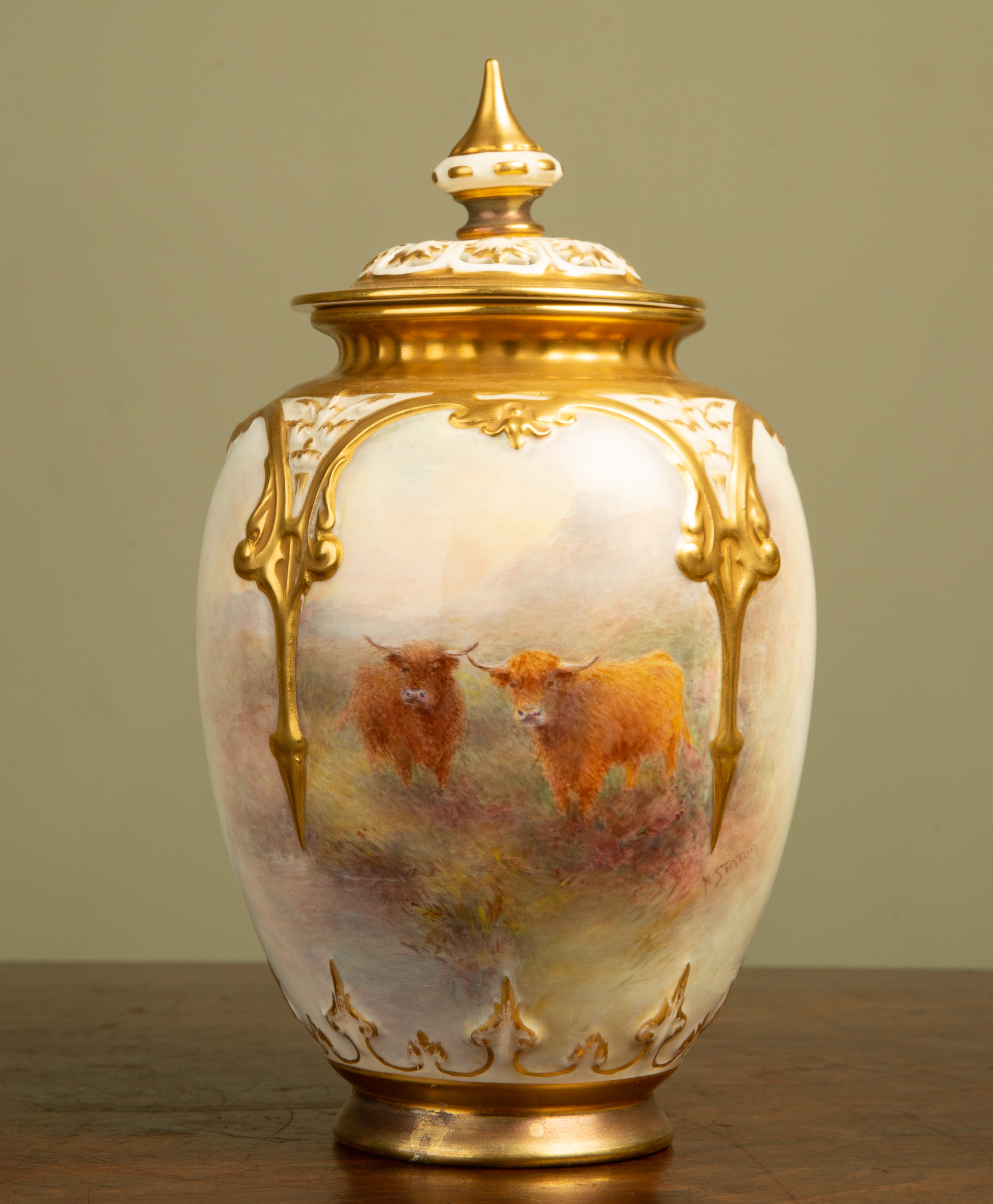 Appraisal: A Royal Worcester porcelain ovoid vase and pierced cover decorated