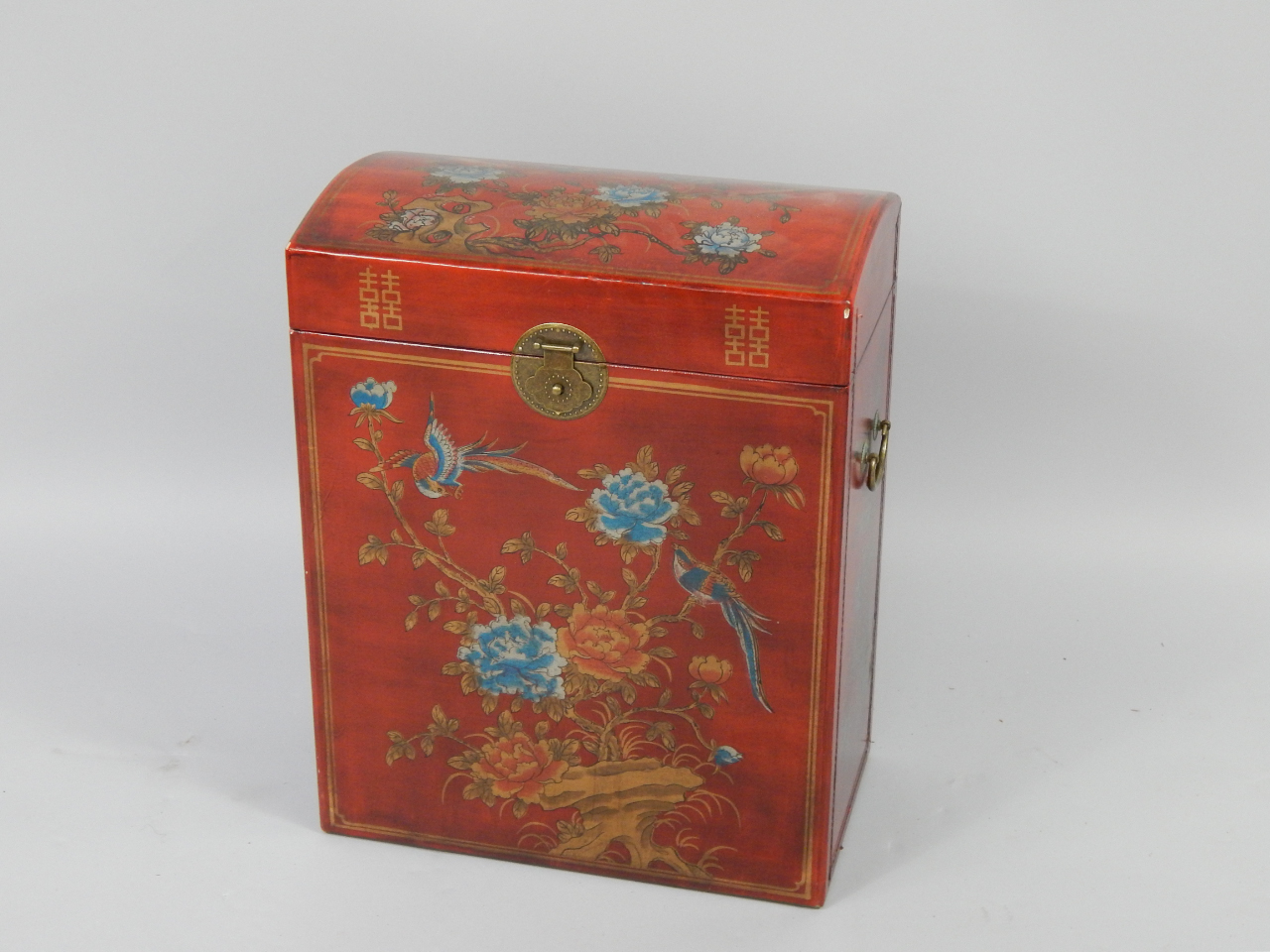 Appraisal: A Chinese domed red lacquer box decorated with panels of