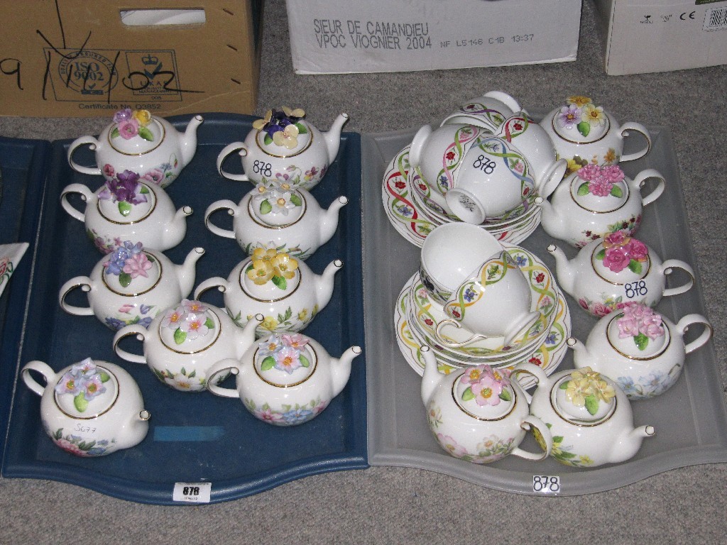 Appraisal: Lot comprising two trays of 'Country Cottage Teapot Collection' and