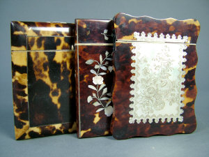 Appraisal: A Victorian tortoiseshell cardcase with two mother of pearl inlaid