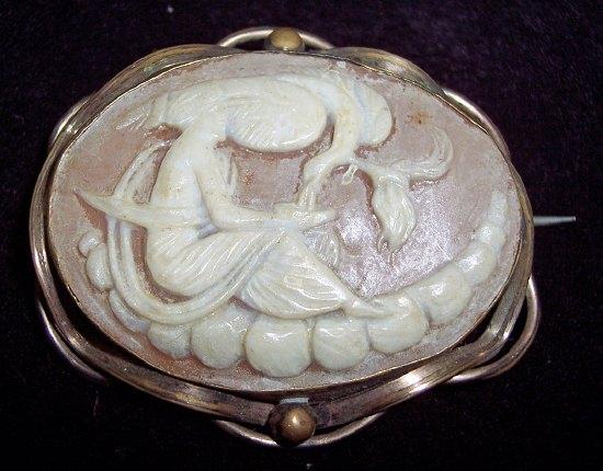 Appraisal: An oval shell cameo brooch carved Leda and the swan