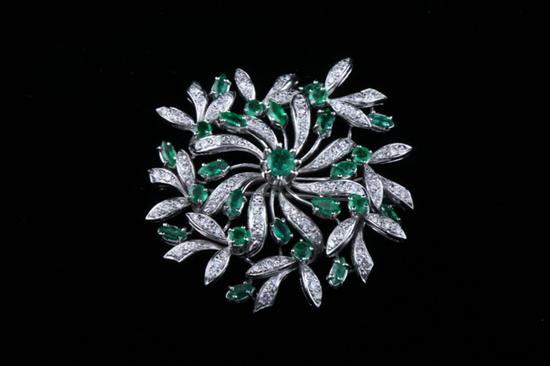 Appraisal: K WHITE GOLD DIAMOND AND EMERALD BROOCH Floral design cluster