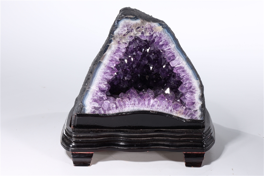 Appraisal: Split amethyst geode on wood stand x x without stand