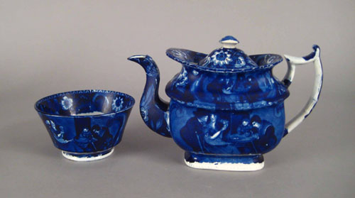 Appraisal: Blue Staffordshire teapot and waste bowl th c depicting Christmas