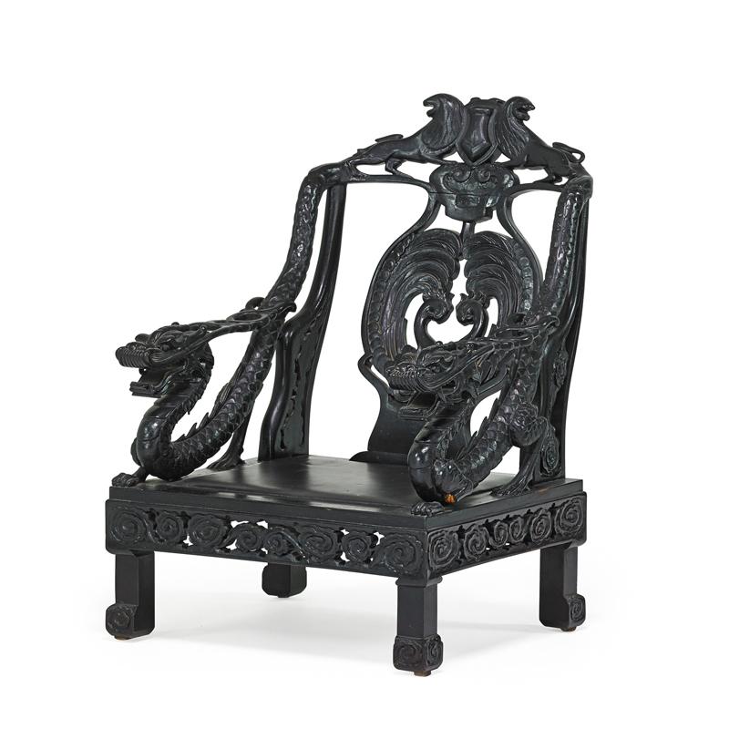 Appraisal: CHINESE OPEN ARMCHAIR Ebonized hardwood with carved design th c