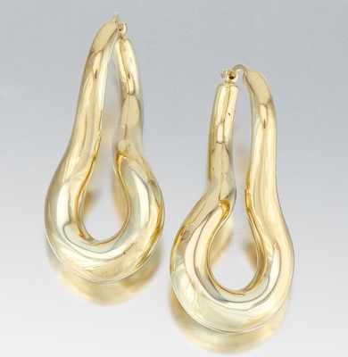 Appraisal: A Pair of Twisted Hoop Earrings Signed Carla k yellow