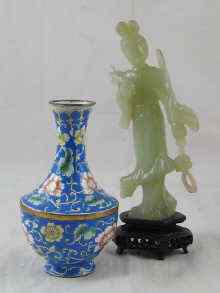 Appraisal: A green hardstone Chinese figure on hardwood stand cm together