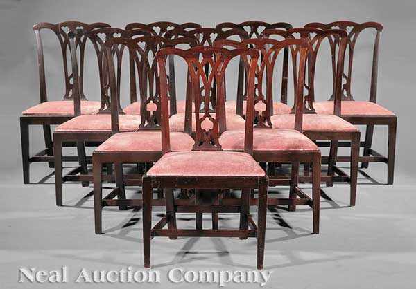 Appraisal: A Set of Twelve George III-Style Carved Mahogany Dining Chairs