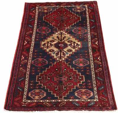 Appraisal: A Persian Tribal Rug Apprx '- x '- Medium wool