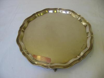 Appraisal: A SALVER of circular form with Chippendale moulded border raised