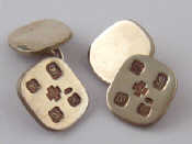 Appraisal: A pair of silver cufflinks with featured hallmarks including the