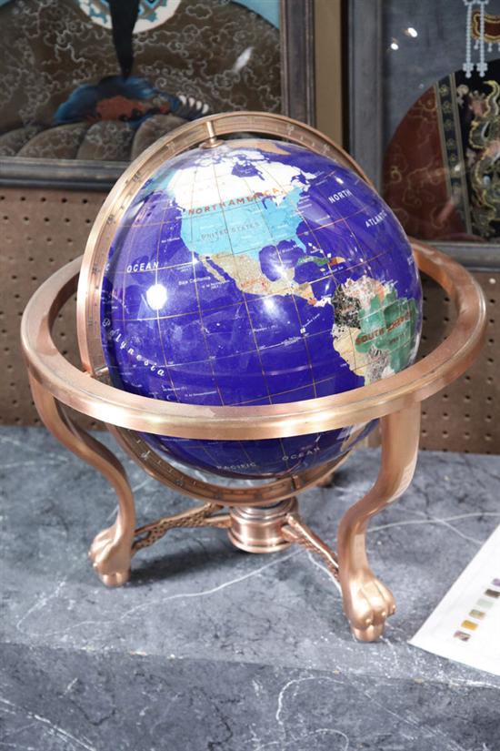 Appraisal: GLOBE Blue ground with countries designated by semi-precious stones In