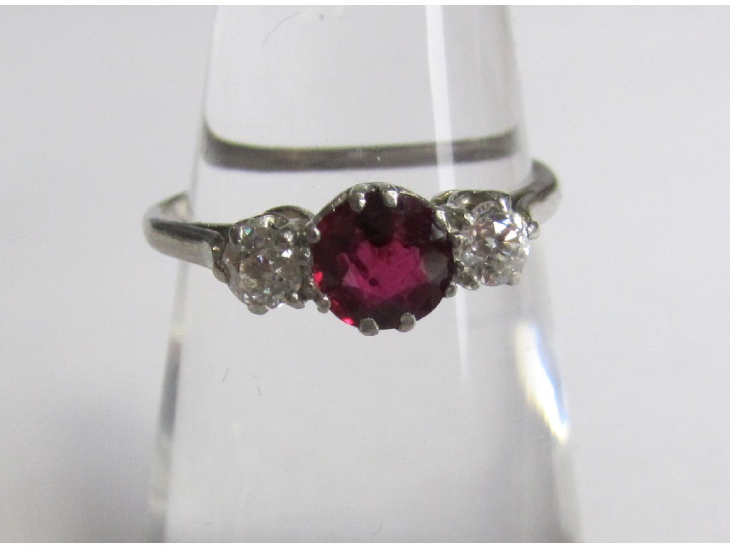 Appraisal: A white metal ruby and diamond three stone ring circa