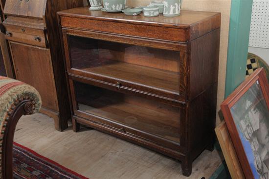 Appraisal: TWO STACK BOOKCASE Oak and of typical form with two