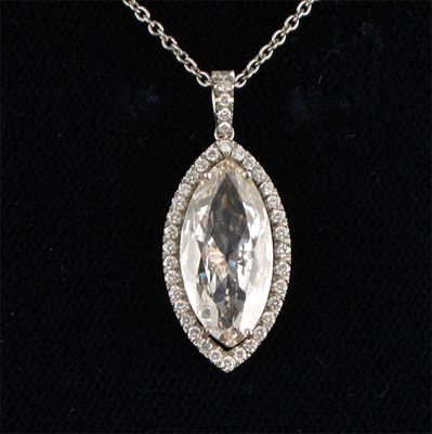 Appraisal: An impressive marquise shaped diamond pendant the diamond measures approximately