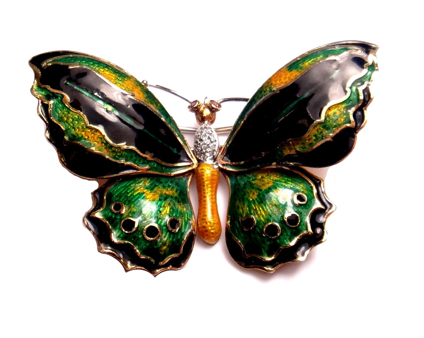 Appraisal: A gold enamelled and diamond set brooch designed as a