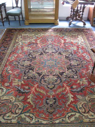 Appraisal: Heriz Persian Handmade Room Size Rug gorgeous central medallion stylized