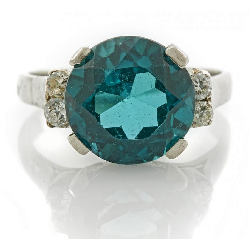 Appraisal: Platinum blue zircon and diamond ring Platinum blue zircon and