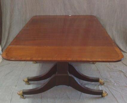 Appraisal: th Cent Banded Mahogany Pedestal Dining Table with Brass Claw