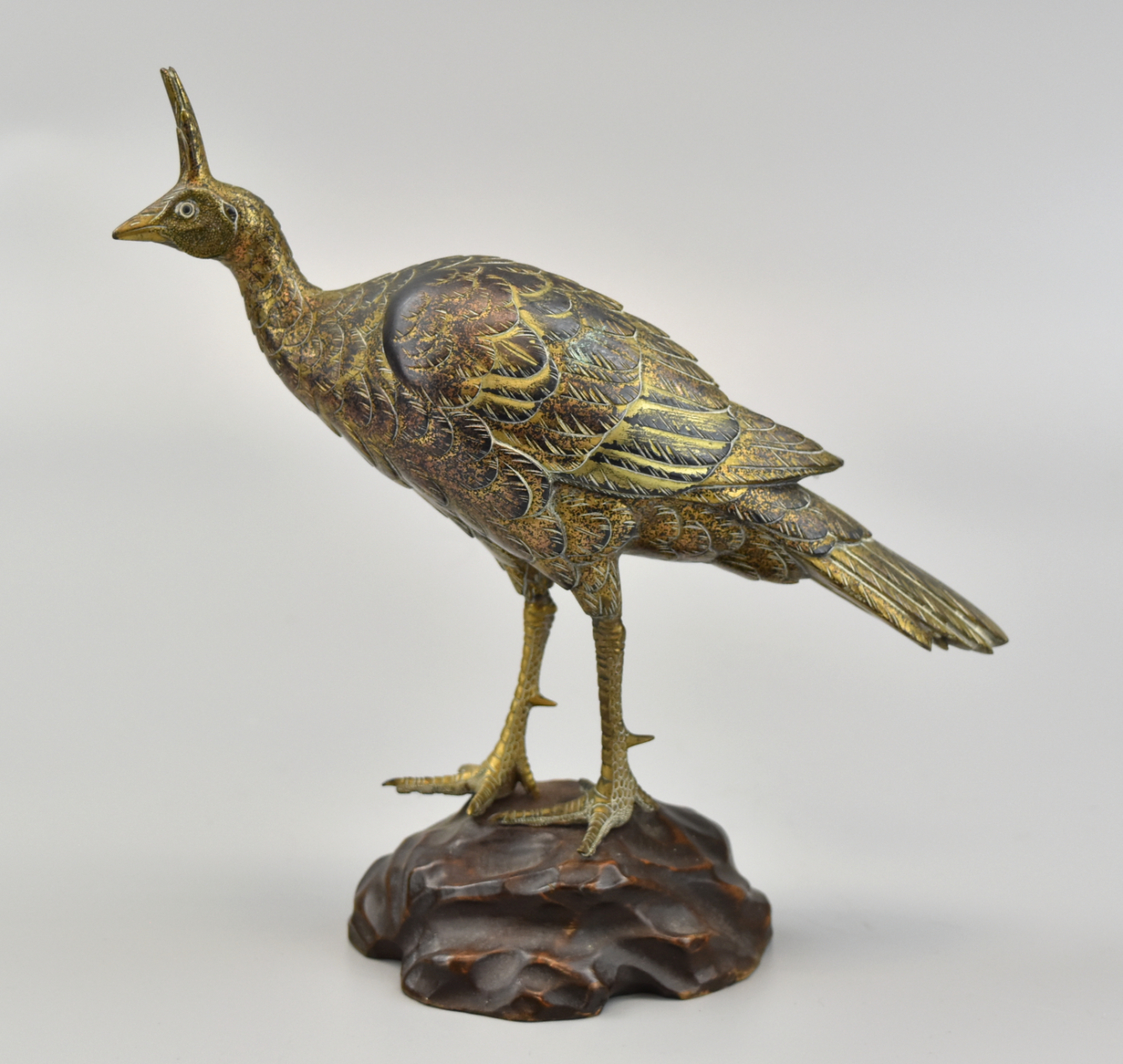 Appraisal: Middle Eastern cast bronze peacock with gilding throughout Fine detail