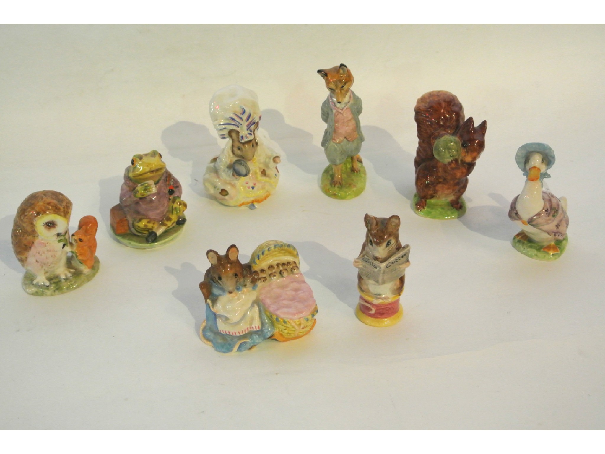 Appraisal: A collection of eight Beswick Beatrix Potter characters comprising Hunca