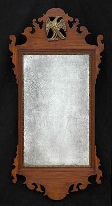 Appraisal: CHIPPENDALE-STYLE MAHOGANY AND PARCEL-GILT MIRROR The antiqued plate within a