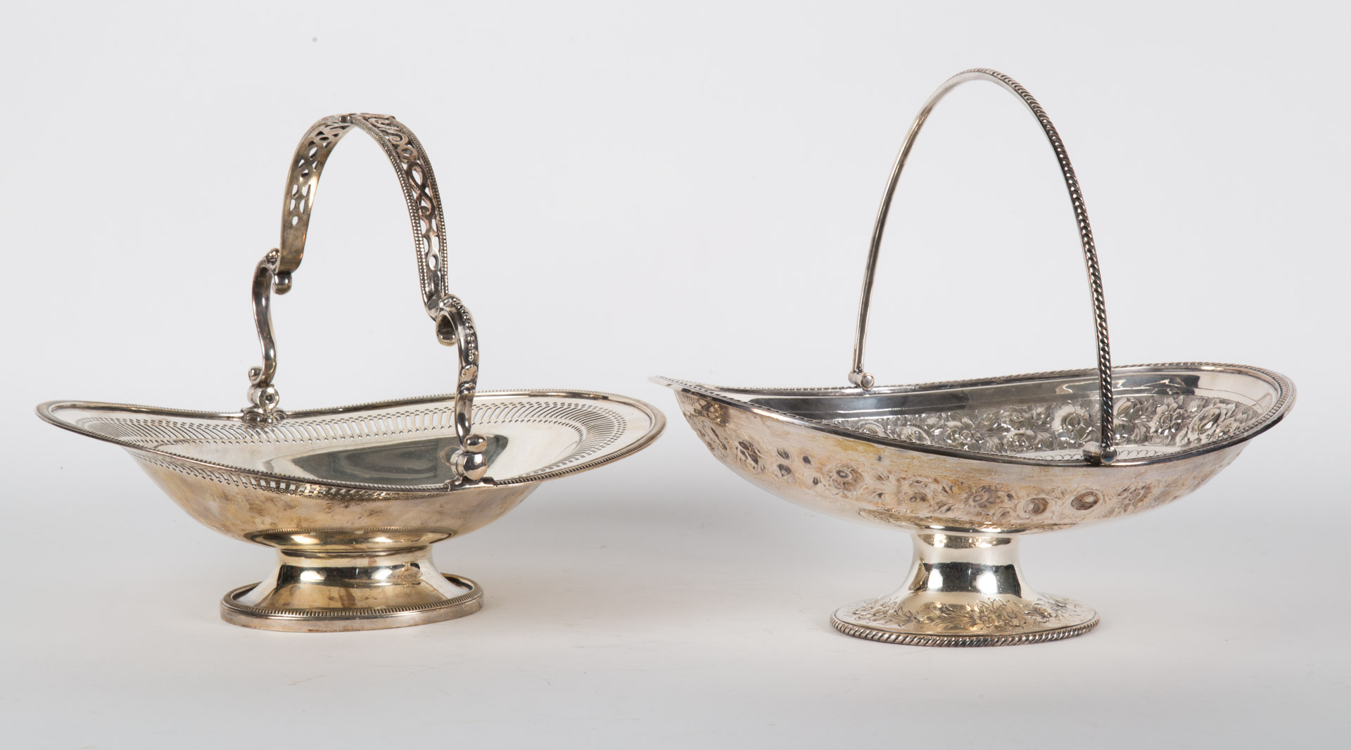 Appraisal: Two Victorian silver-plated baskets early Victorian silver-plated engraved and floral