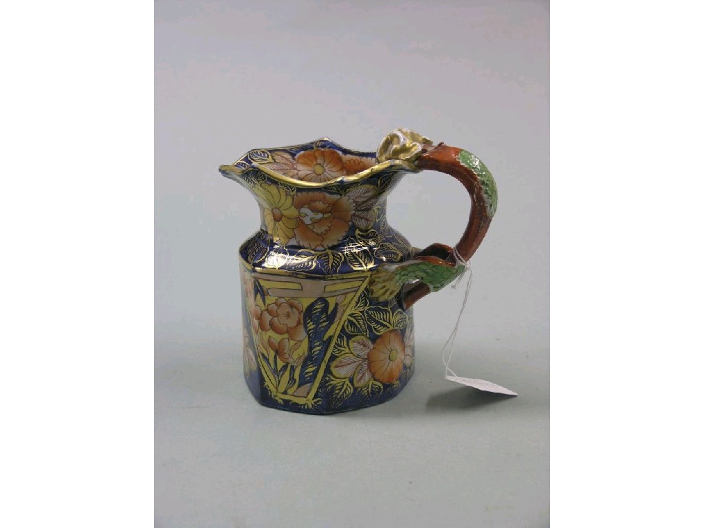 Appraisal: A mid th century Ironstone china jug hydra form painted