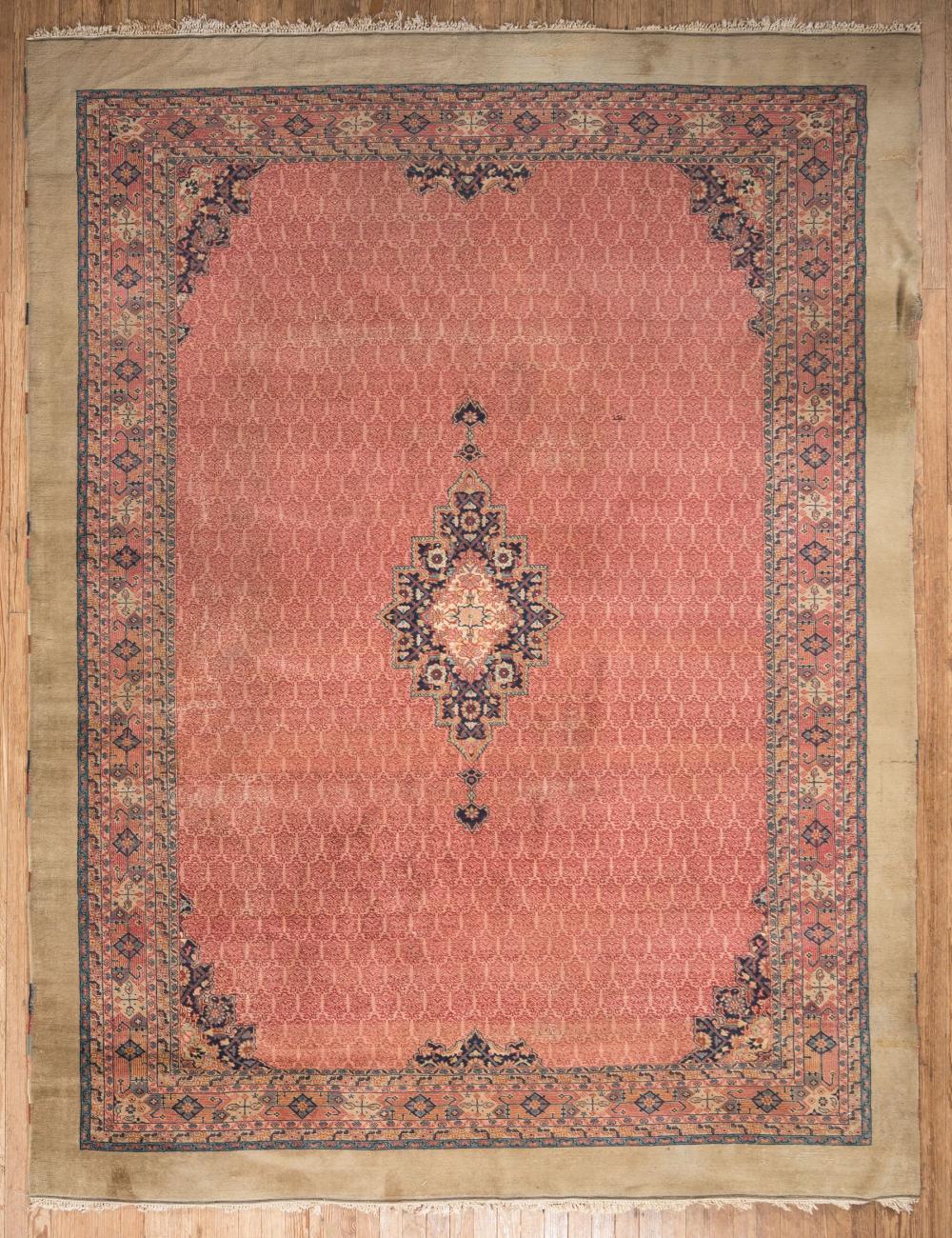 Appraisal: Persian Carpet red ground cartouche field cream border ft in