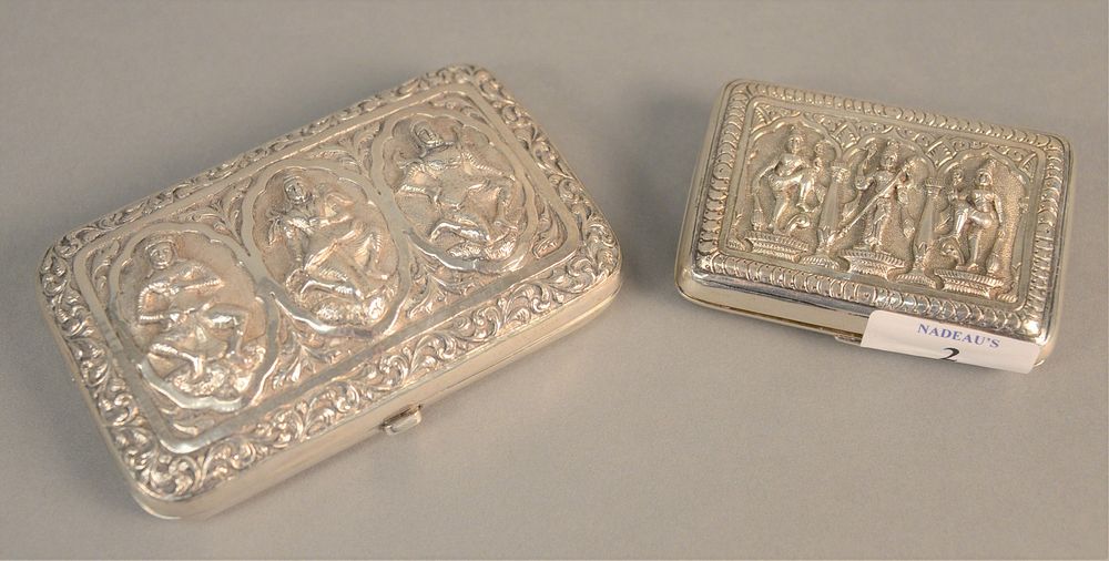 Appraisal: Two Indonesian silver cigarette boxes with figures one inscribed 'Lt