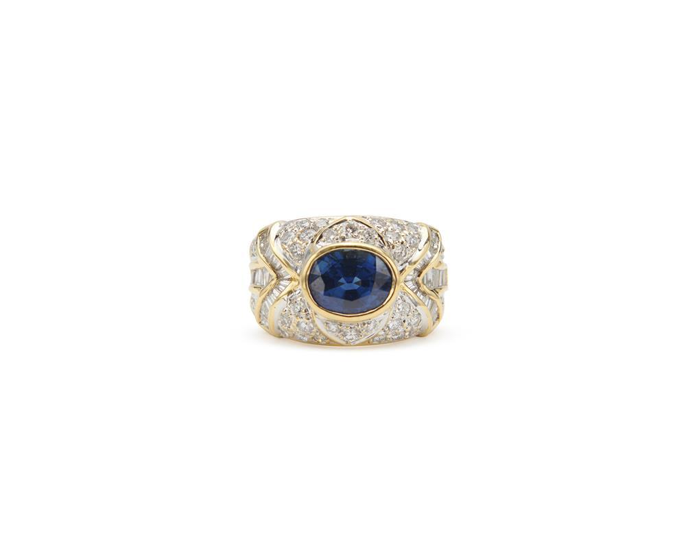 Appraisal: K Gold Sapphire and Diamond Ring centering a bezel-set oval-cut