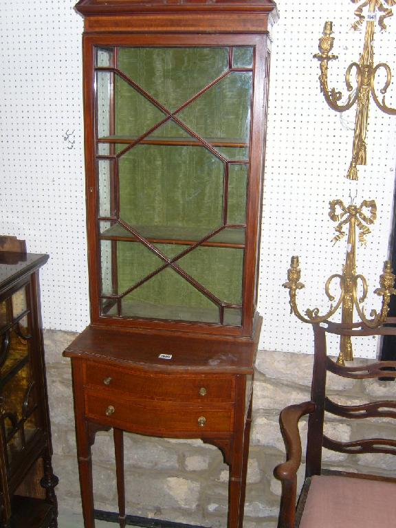 Appraisal: A small inlaid Edwardian mahogany cabinet the lower section fitted