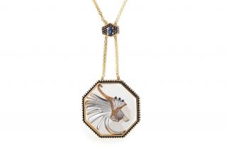 Appraisal: A Pendant Chain by Erte Frosted rock crystal octagonal pendant