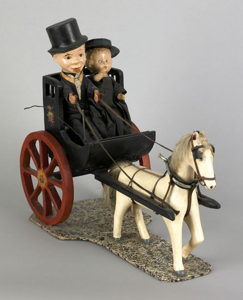 Appraisal: Joseph Gregory carved horse and buggy with composition doll riders