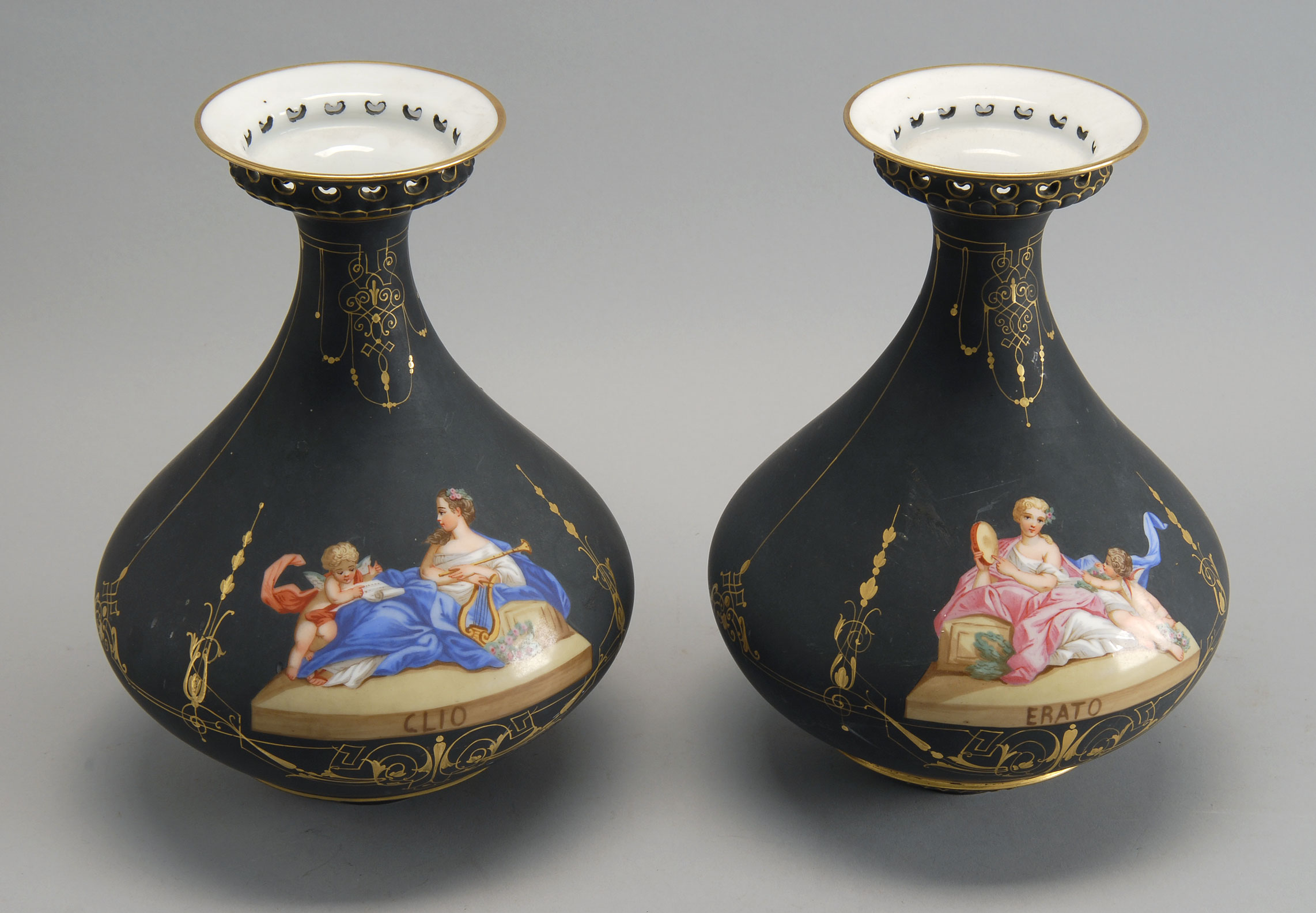 Appraisal: PAIR OF FRENCH PORCELAIN EBONIZED VASES in bulb form with