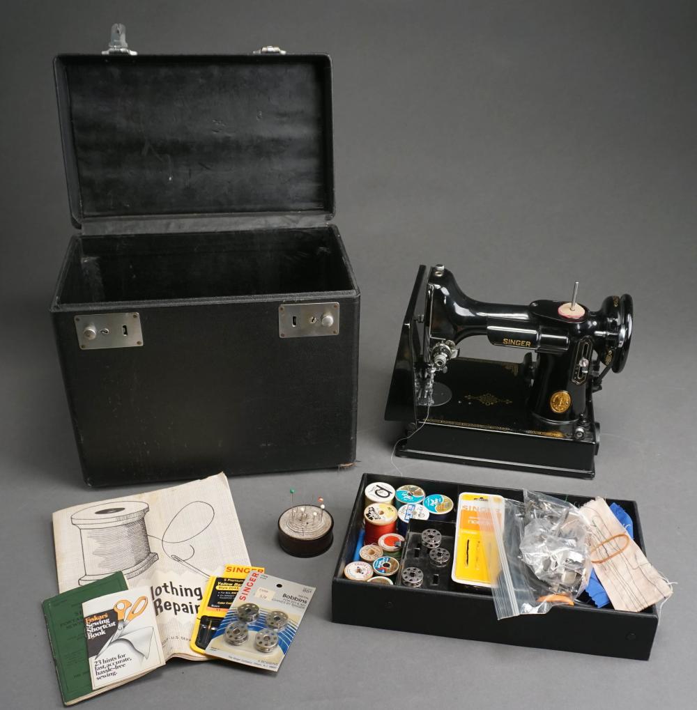 Appraisal: SINGER FEATHERWEIGHT SEWING MACHINE AND ACCESSORIES IN CASESinger Featherweight Sewing