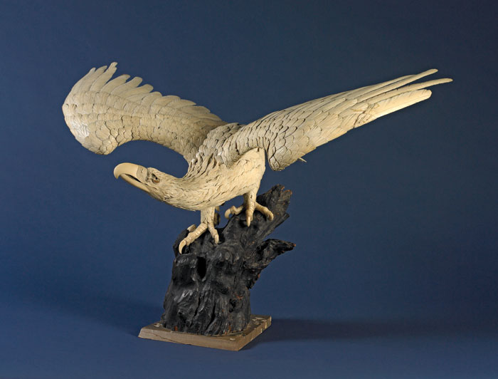 Appraisal: JAPANESE CARVED AND INCISED IVORY EAGLE Naturalistically carved with spread