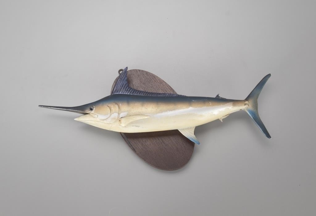 Appraisal: c in long A full-body marlin carving mounted on an