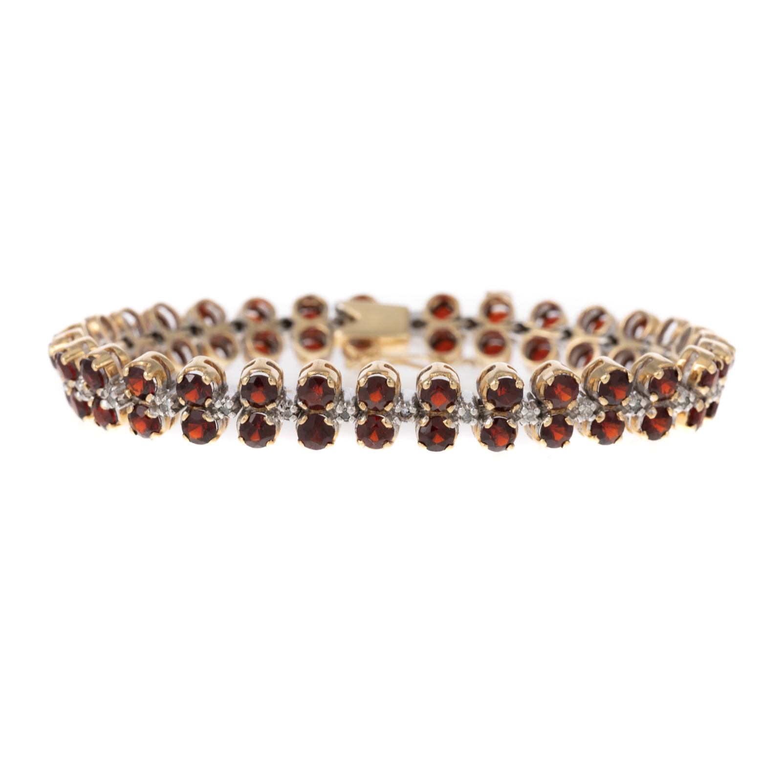 Appraisal: A GARNET DIAMOND LINK BRACELET IN K K yellow gold