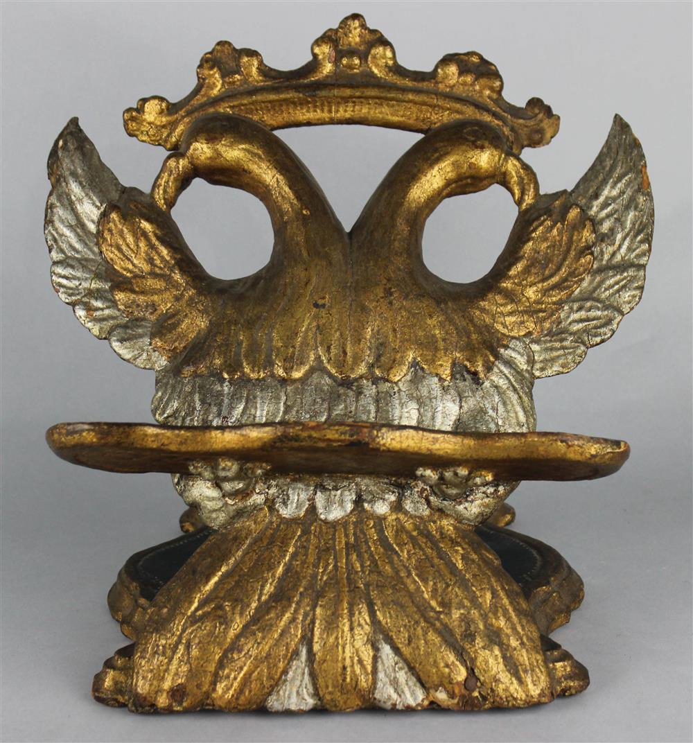 Appraisal: GILT FIGURAL BOOK STAND IN THE FORM OF A CROWNED