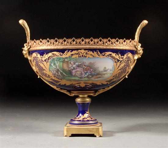 Appraisal: French gilt-metal-mounted Sevres style bleu de roi porcelain centerpiece late