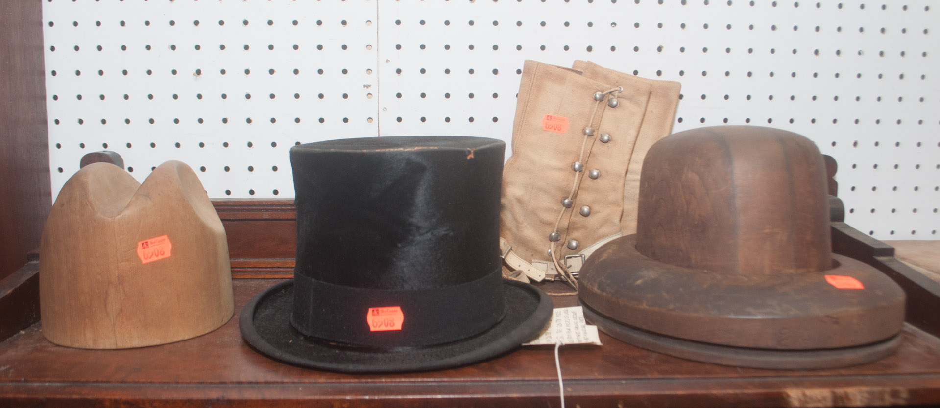 Appraisal: Two hat molds top hat and pair of leggings Undernumber