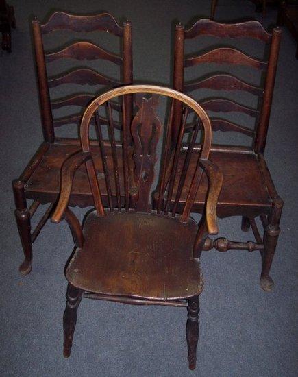 Appraisal: A Windsor type chair with pierced splat and dished elm