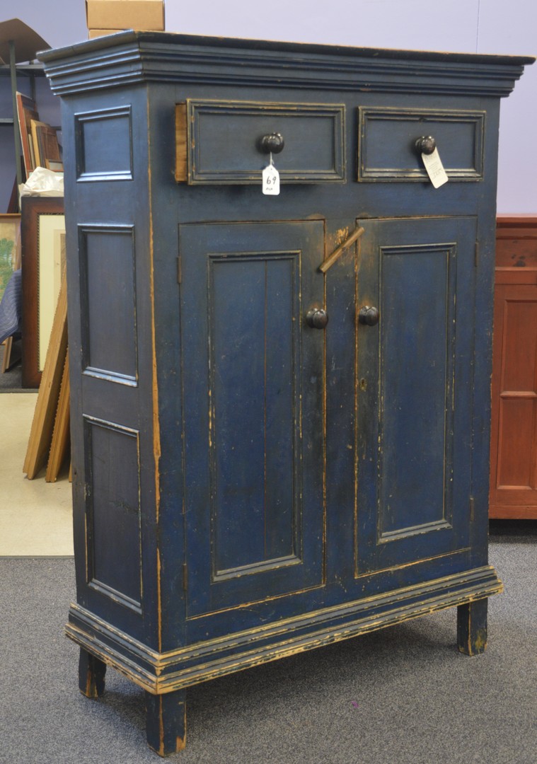 Appraisal: Pine jelly cupboard drawers with molded edges over paneled doors