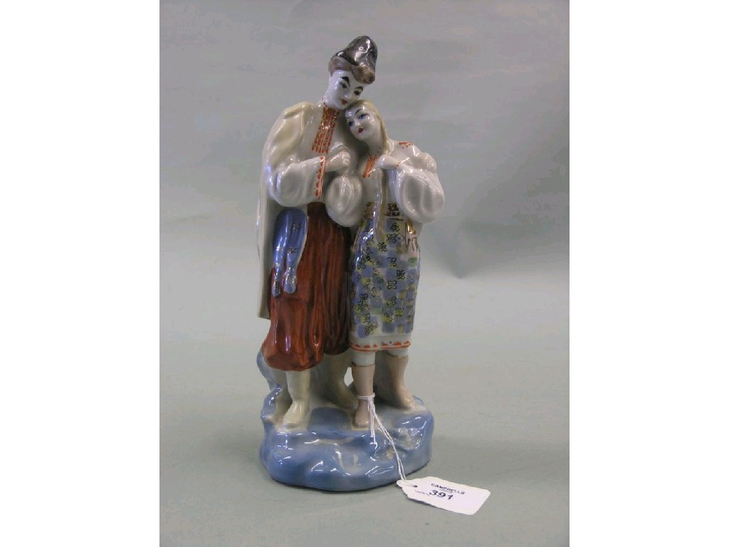 Appraisal: A Russian porcelain figure group gentleman and female companion embraced