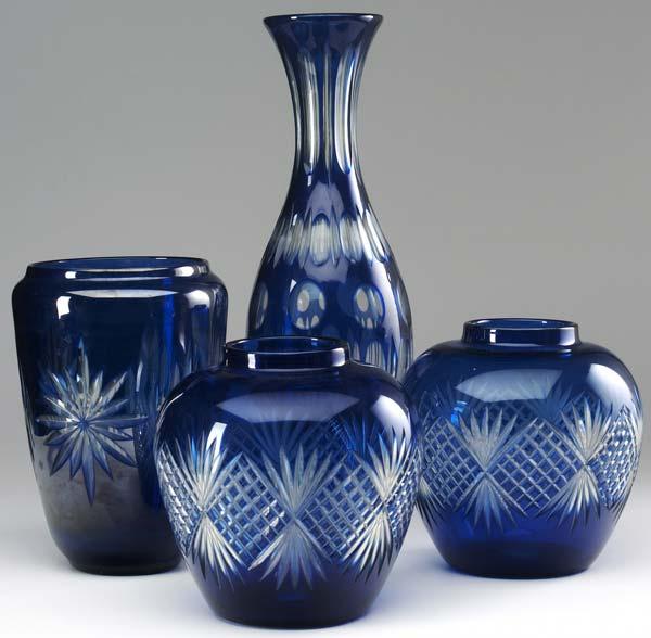 Appraisal: DURAND Four glass vases with cut floral or geometric design